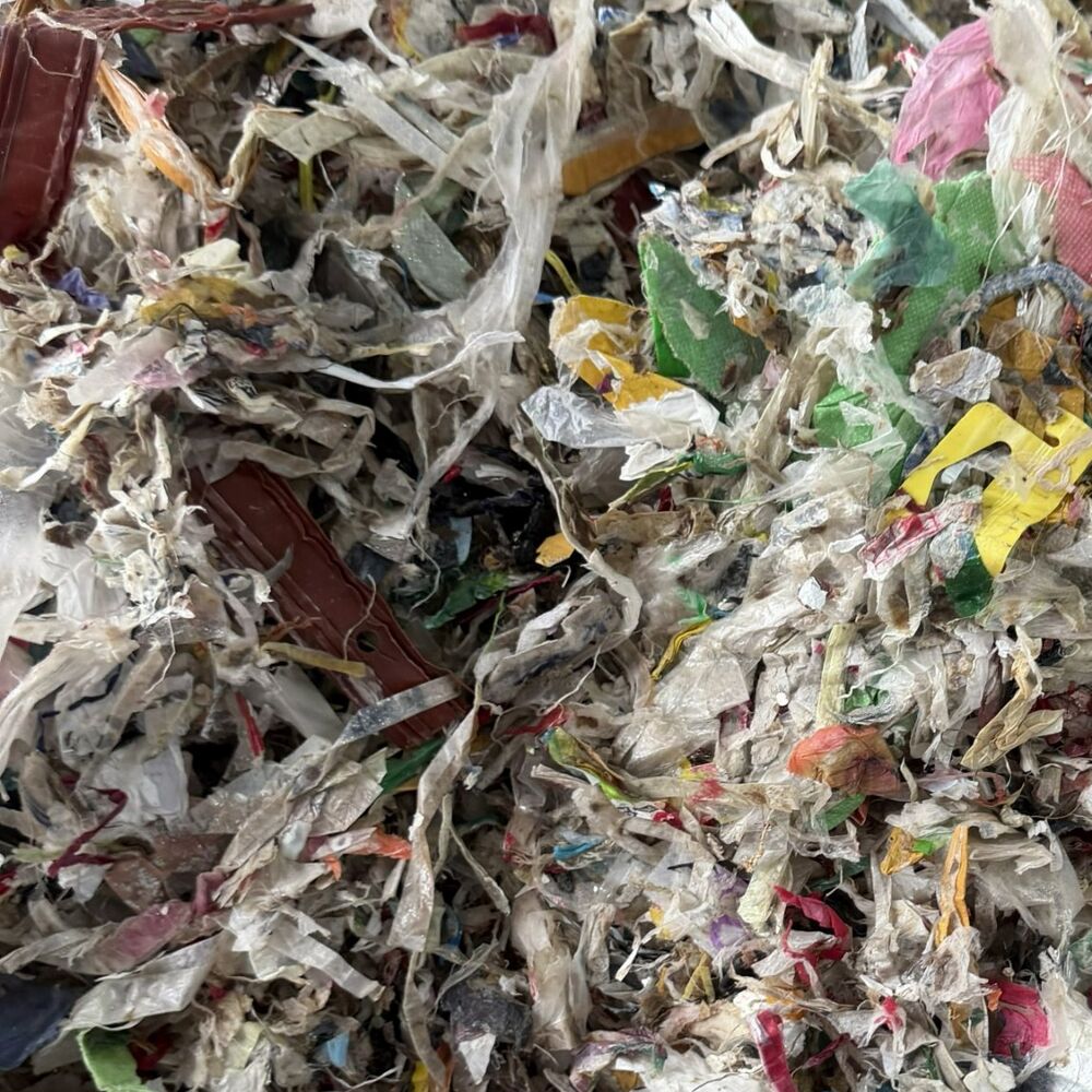 Shredded mixed plastic waste